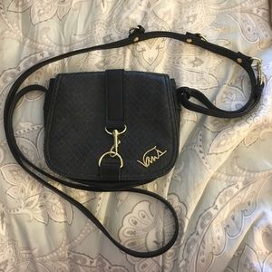 Cans cross body purse